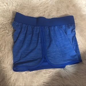 Blue shorts with spandex inside
